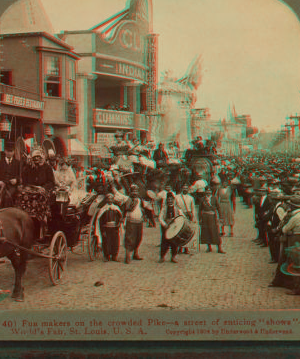 Fun makers on the crowded Pike - a street enticing "shows". St. Louis, Mo. 1903-1905