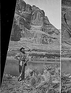 Glen Canyon. John F. Steward with his gun, pick and shoulder bag (map case?) and wearing the usual wide brim felt hat. Old nos. 307, 404, 414, 609.