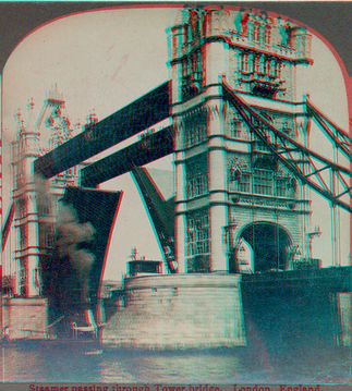 Steamer passing through Tower Bridge, London, England