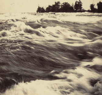 View of the rapids, looking towards the Three Sisters