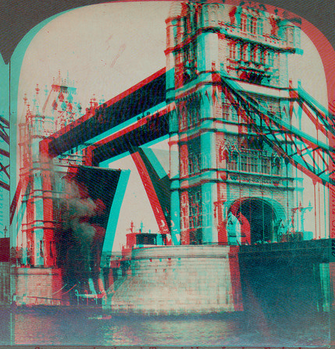 Steamer passing through Tower Bridge, London, England