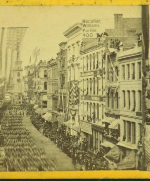 [View of a parade down Washington Street.] 1859?-1901?
